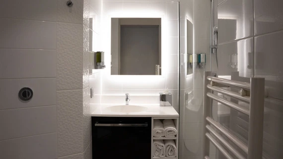 modern bathroom shower in a room at OSKO Hotel Toulouse-Blagnac