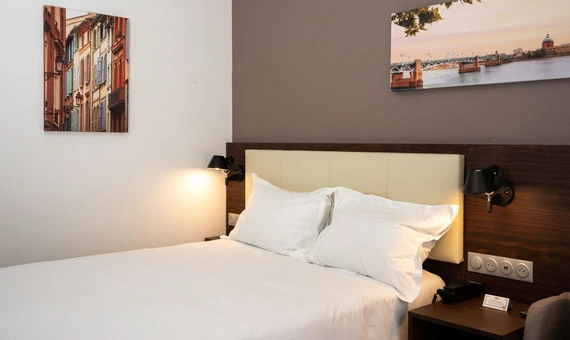 Large premium double bed at OSKO Hotel Toulouse-Blagnac