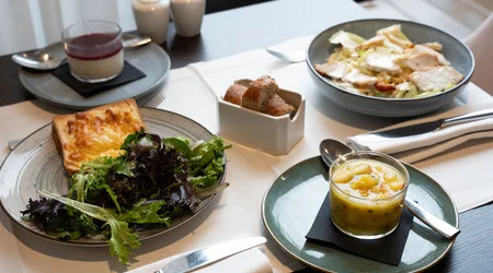 Hot croque-monsieur with salad served as a 24/7 snack at OSKO Hotel Toulouse-Blagnac